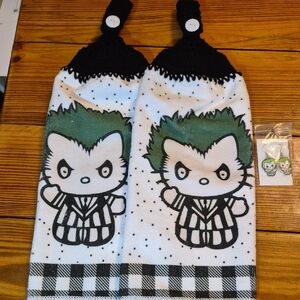 Crochet Top Towels With Hello Kitty Dressed Up As Beetlejuice And Earrings